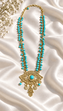 Load image into Gallery viewer, Dania eye and hamsa stainless necklace on satin